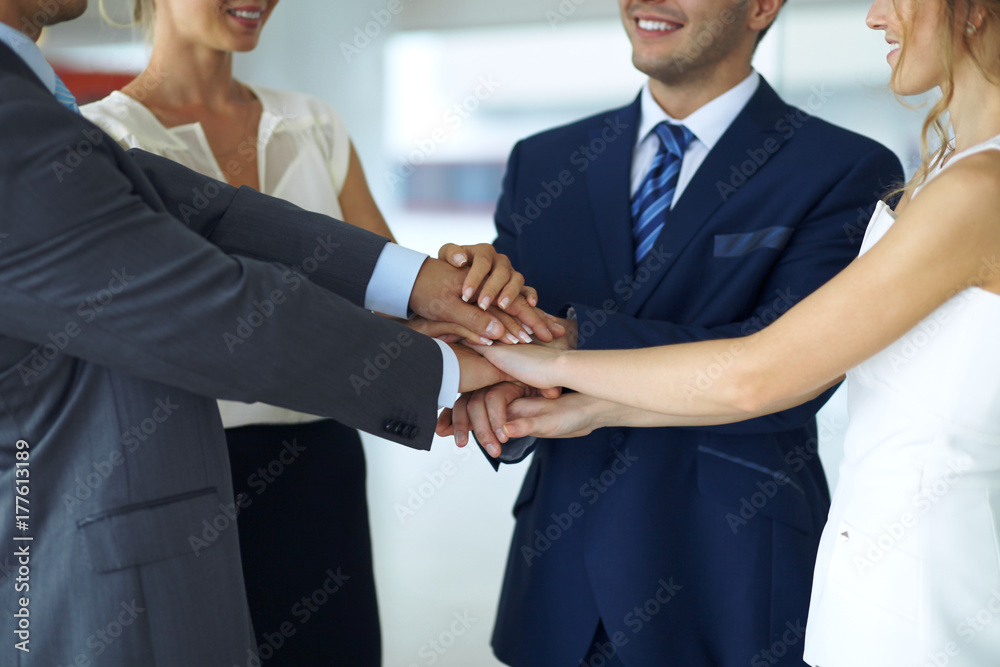 Business people group joining hands