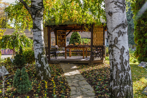 Fotobehang Wooden summer house in the garden