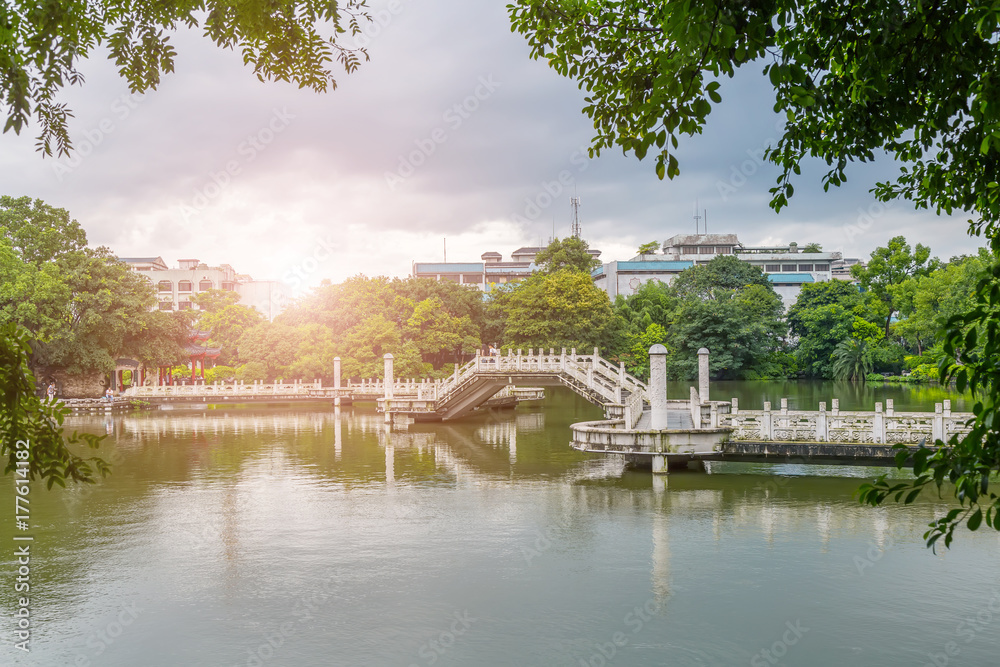 Chinese classical garden stone bridge lake