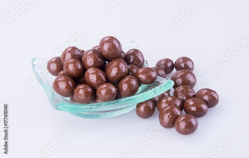 chocolate balls. chocolate balls in bowl on a background