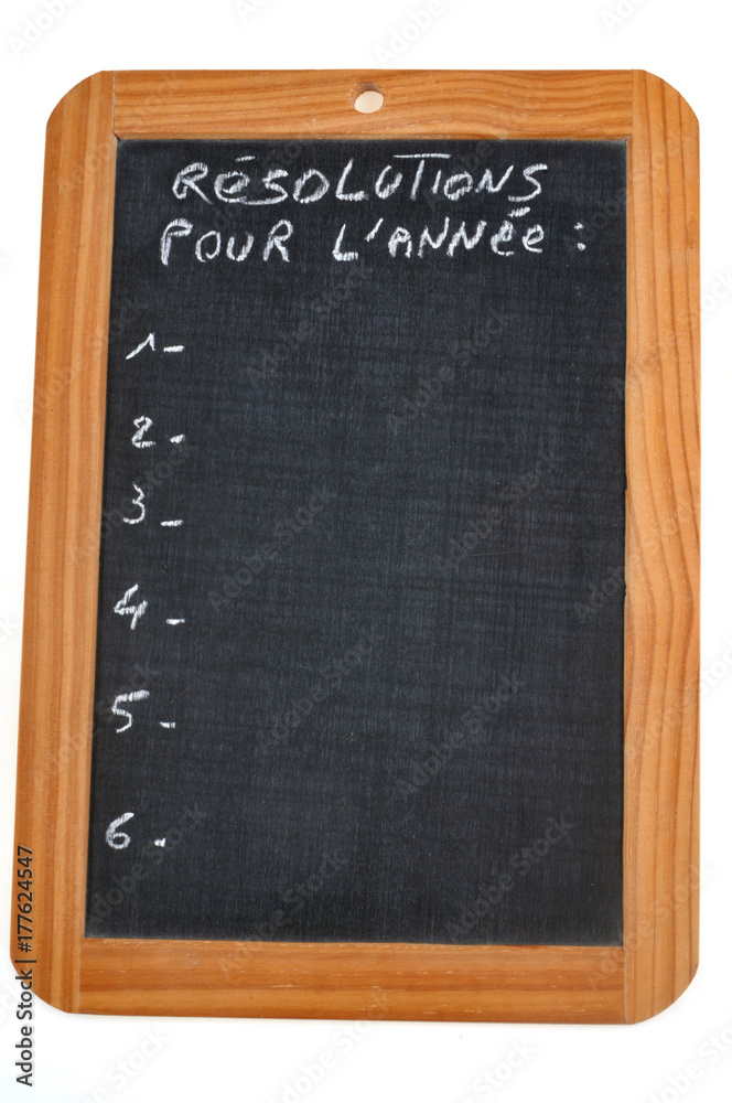 Ardoise sur laquelle est écrit résolutions pour l'année Ardoise sur laquelle est écrit résolutions pour l'année