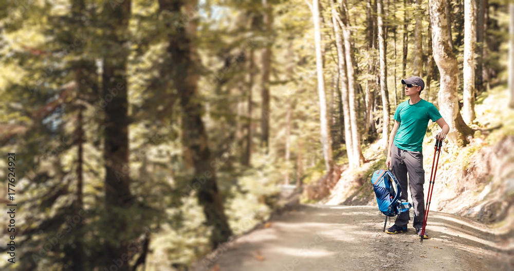 Photo of guy with sticks for sport walking Photo of guy with sticks for sport walking
