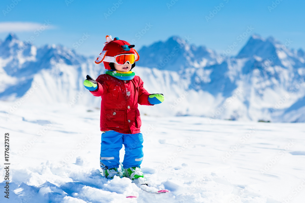 Kids winter snow sport. Children ski. Family skiing.