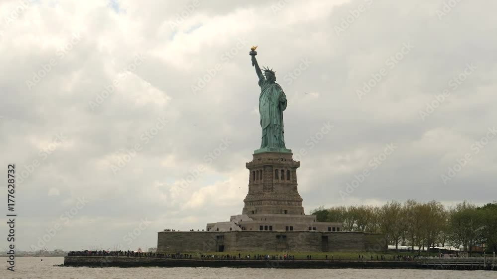 Statue of Liberty on an overcast day, approach shot from boat. Statue of Liberty on an overcast day, approach shot from boat.