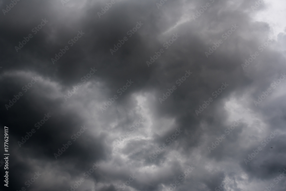 dark storm clouds with background,Dark clouds before a thunder-storm. dark storm clouds with background,Dark clouds before a thunder-storm.