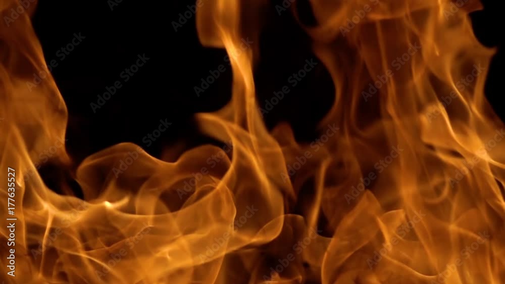 Flames of fire on black background in slow motion Flames of fire on black background in slow motion