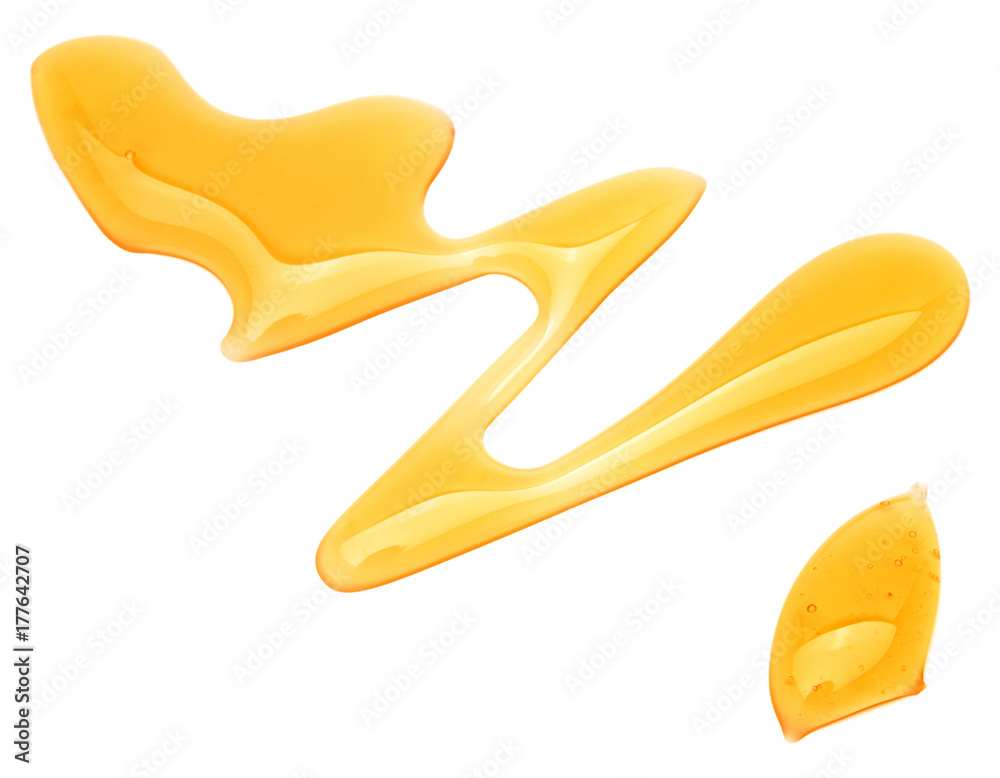 Sweet honey drips isolated on white background. Syrup droplet, nectar drops. Sweet honey drips isolated on white background. Syrup droplet, nectar drops.