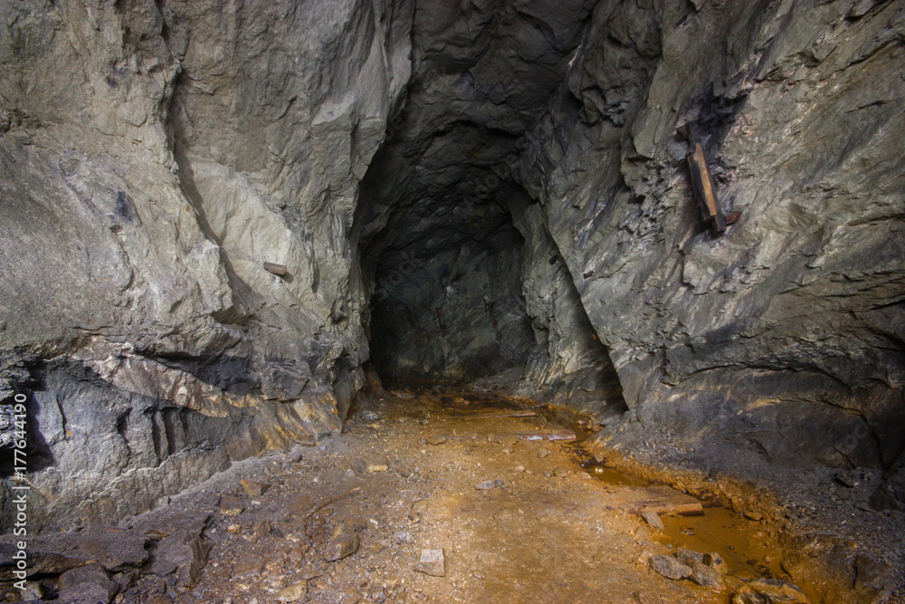 Underground abandoned mica ore mine shaft tunnel gallery passage