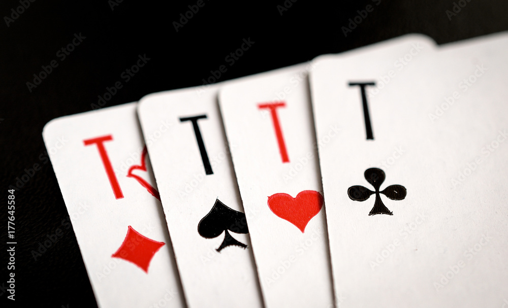 four aces on the black background, playing cards