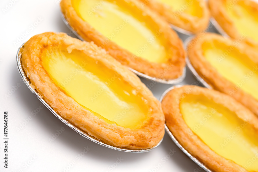 fresh egg tarts on a white background
