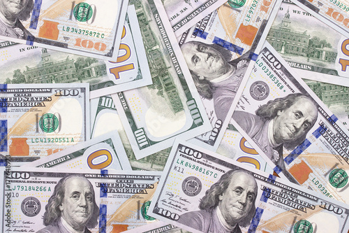100 US dollar abstract money cash background.