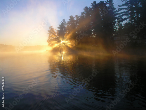 Sunlight at dawn on a lake