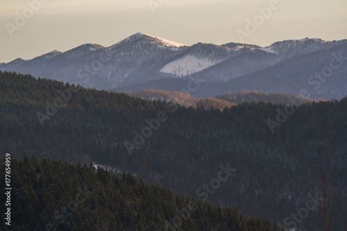 Mountain ridge in winter in the snow