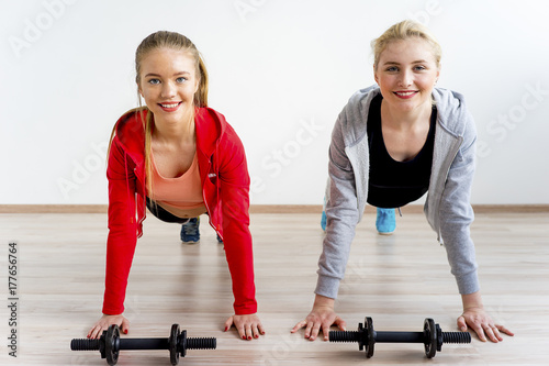 Fototapeta Naklejka Na Ścianę i Meble -  Two girls in a gym