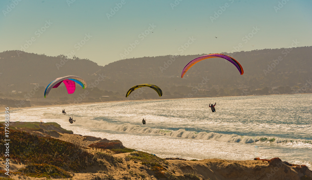Paragliding over the beach and sea in Monterey Ca. Paragliding over the beach and sea in Monterey Ca.
