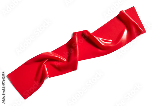 Red scotch tape piece isolated on white background