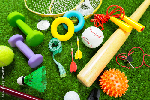 Various sport tools on grass