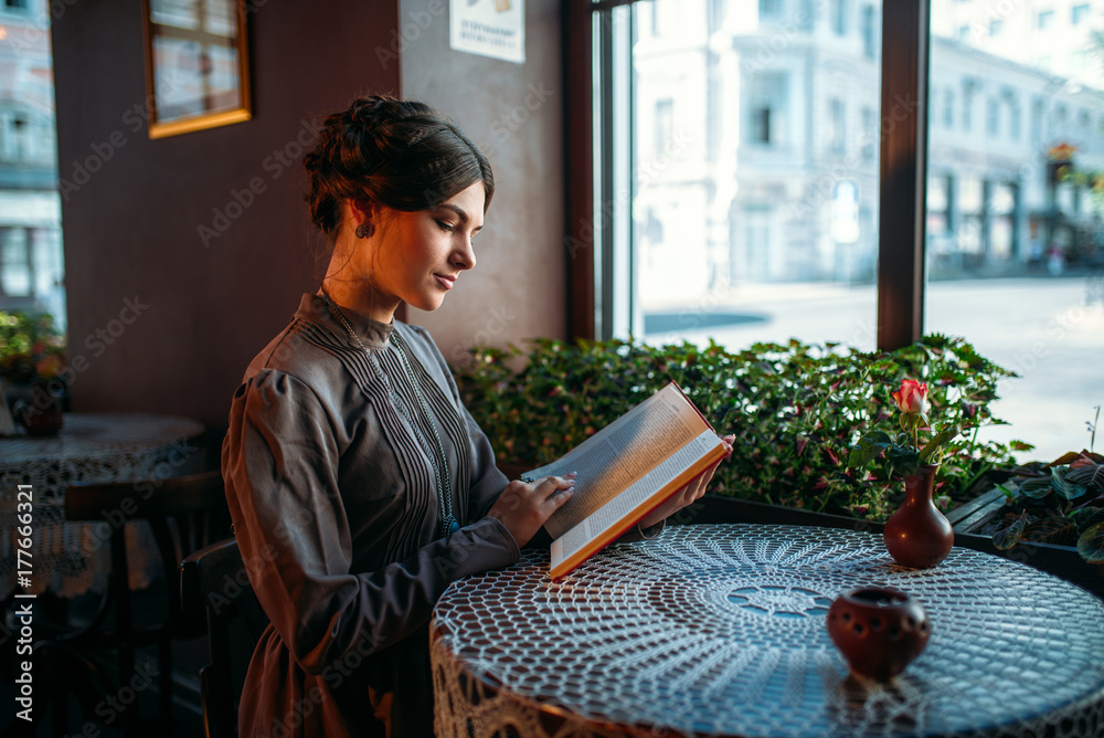 Young smiling happy woman in cafe Young smiling happy woman in cafe