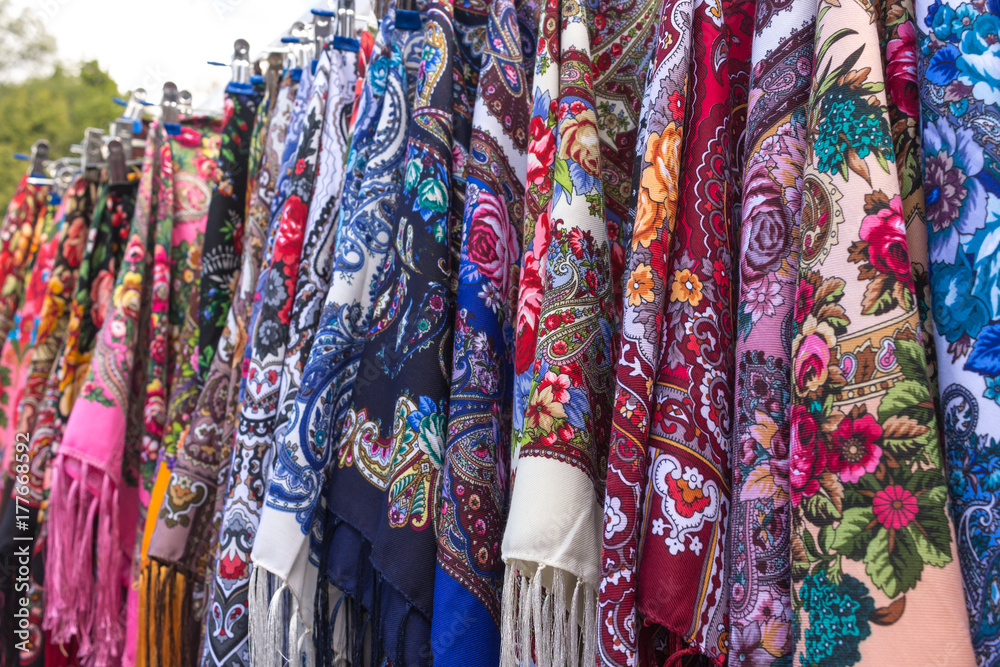 Russian colorful traditional scarfs for sale in a gift shop