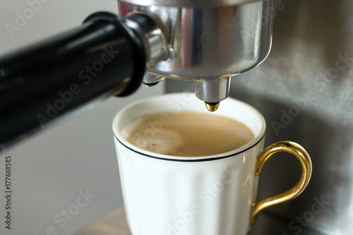 coffee machine with white cup fragment