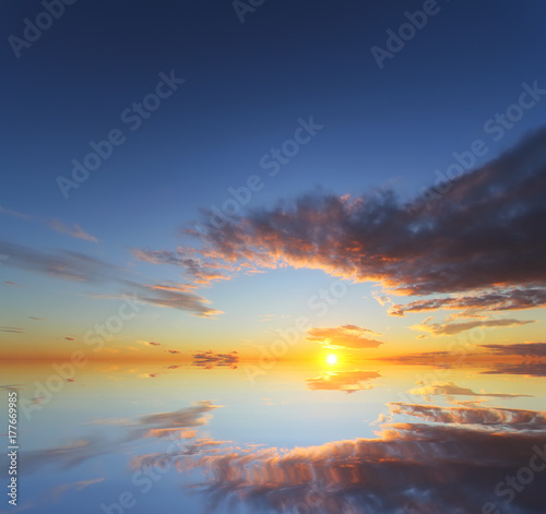 Beautiful sunset over the ocean with dramatic autumn sky. Abstract natural composition © sergeialyoshin