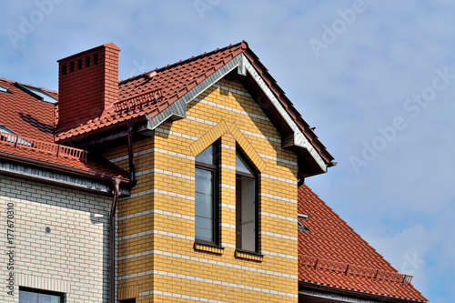 Attic windows on tile roof