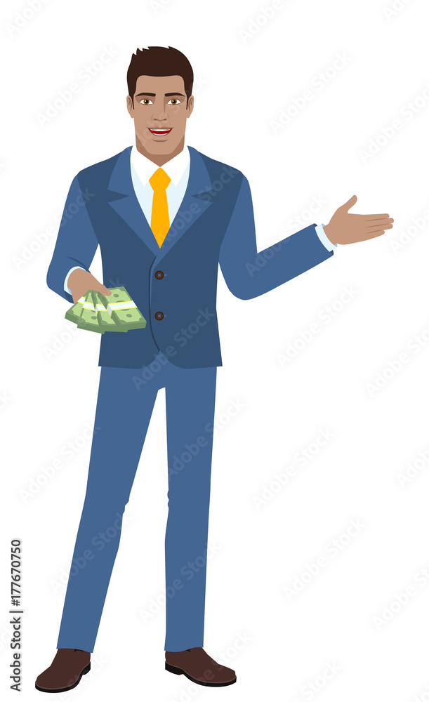 Welcome! Businessman with money showing something beside of him Welcome! Businessman with money showing something beside of him