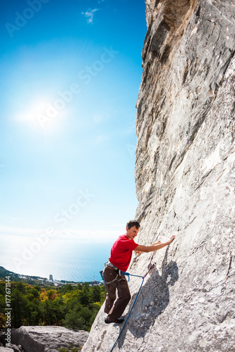 A rock climber on a rock.