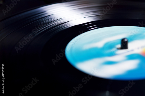 vinyl disc spinning on turntable