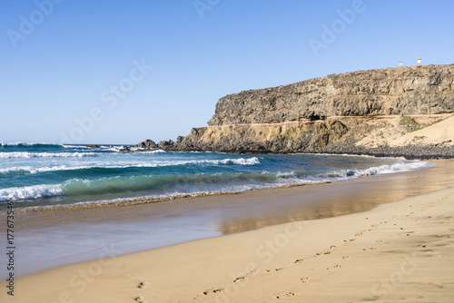 Remote surfers bay, beach at the west coast of Fuerteventura, Canary Islands.