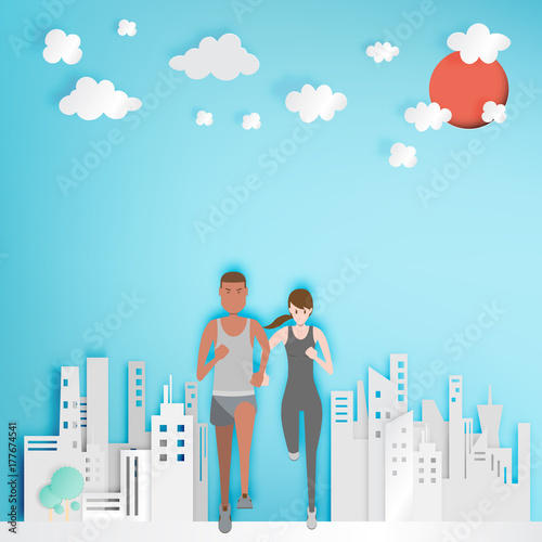 Couple running with paper city background
