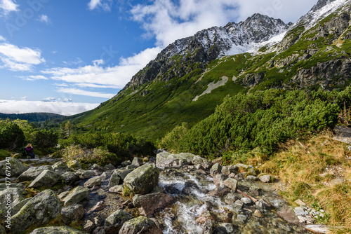 panoramic view of Tatra mountains in Slovakia covered with snow and hiding in mist © Martins Vanags