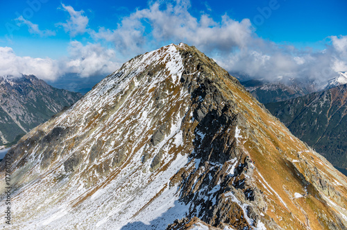 Fototapeta Naklejka Na Ścianę i Meble -  Tatra mountains panorama, snow covered peak on autumn day