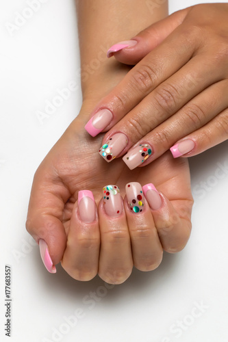 wedding french gently pink manicure with sparkles of confetti on long square nails 