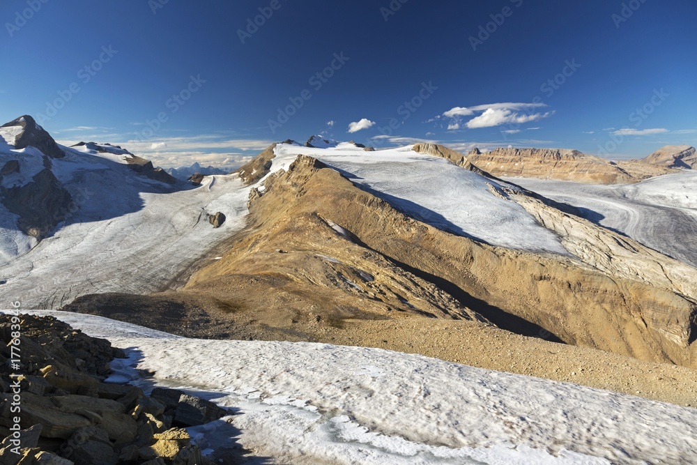 Panoramic Landscape View from Summit of Yoho Peak with Distant Canada Rocky Mountains and Snowy Glaciers of Yoho and Banff National Park on the Horizon