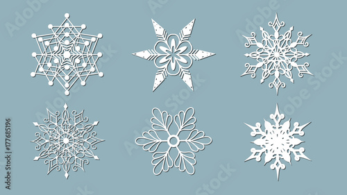 Set of snowflakes. Laser cut pattern for christmas paper cards, design elements, scrapbooking. Vector illustration.