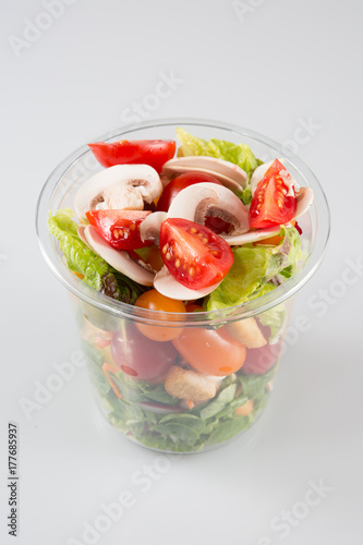 Salad in plastic container Takeaway salads on white background