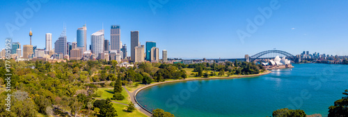 Beautiful panorama of the Sydney harbour district with Harbour bridge, Botanical garden and the Opera building.