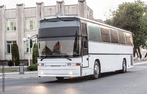 tourist bus goes on the city street