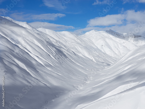 Winter mountains, snow valley in Italian Alps. Livignio photo