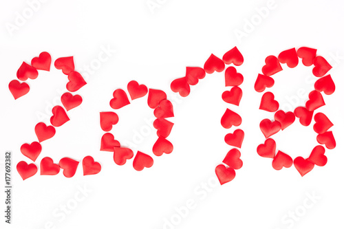 Happy new 2018 year, number with red hearts above white backgrou