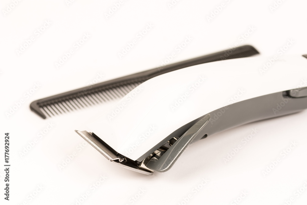 White haircut trimmer isolated above white background with copy