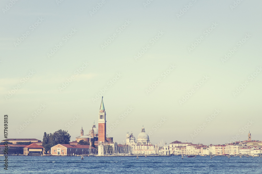 Fototapeta premium Bell tower of St Mark's Square and Doge's Palace Venice Italy with marina for sailboats, , Viewpoint from canal, Bell tower in Venice, Background Venice in Italy