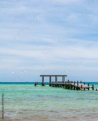 Fototapeta Naklejka Na Ścianę i Meble -  Wooden Pier Beach Scene at Playa del Carmen, Quintana Roo, Mexico