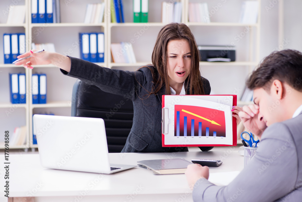 Business meeting between businessman and businesswoman Business meeting between businessman and businesswoman