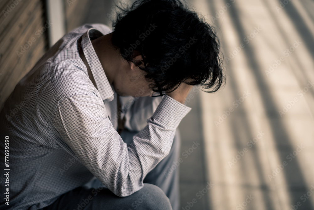 business man is stressed from his work. depression and anxiety concept. business man is stressed from his work. depression and anxiety concept.