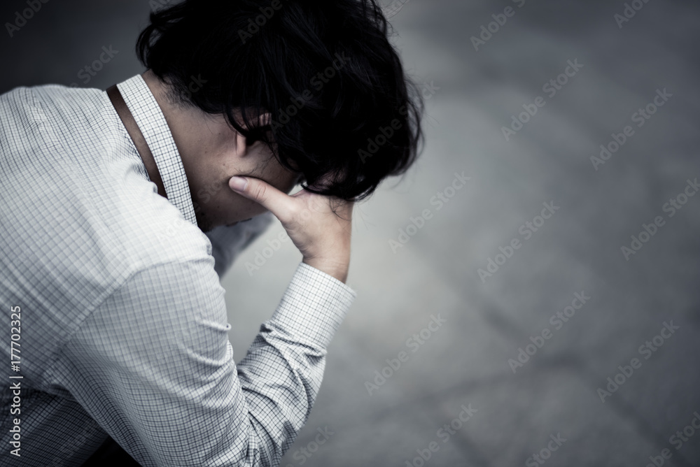 business man is stressed from his work. depression and anxiety concept. business man is stressed from his work. depression and anxiety concept.