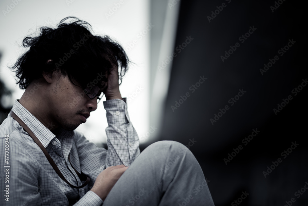 business man is stressed from his work. depression and anxiety concept. business man is stressed from his work. depression and anxiety concept.