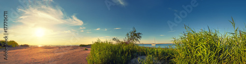 Panoramic image of a seaside by lighthouse in Swinoujscie, Poland © tilialucida