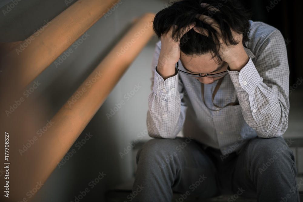 business man is stressed from his work. depression and anxiety concept. business man is stressed from his work. depression and anxiety concept.